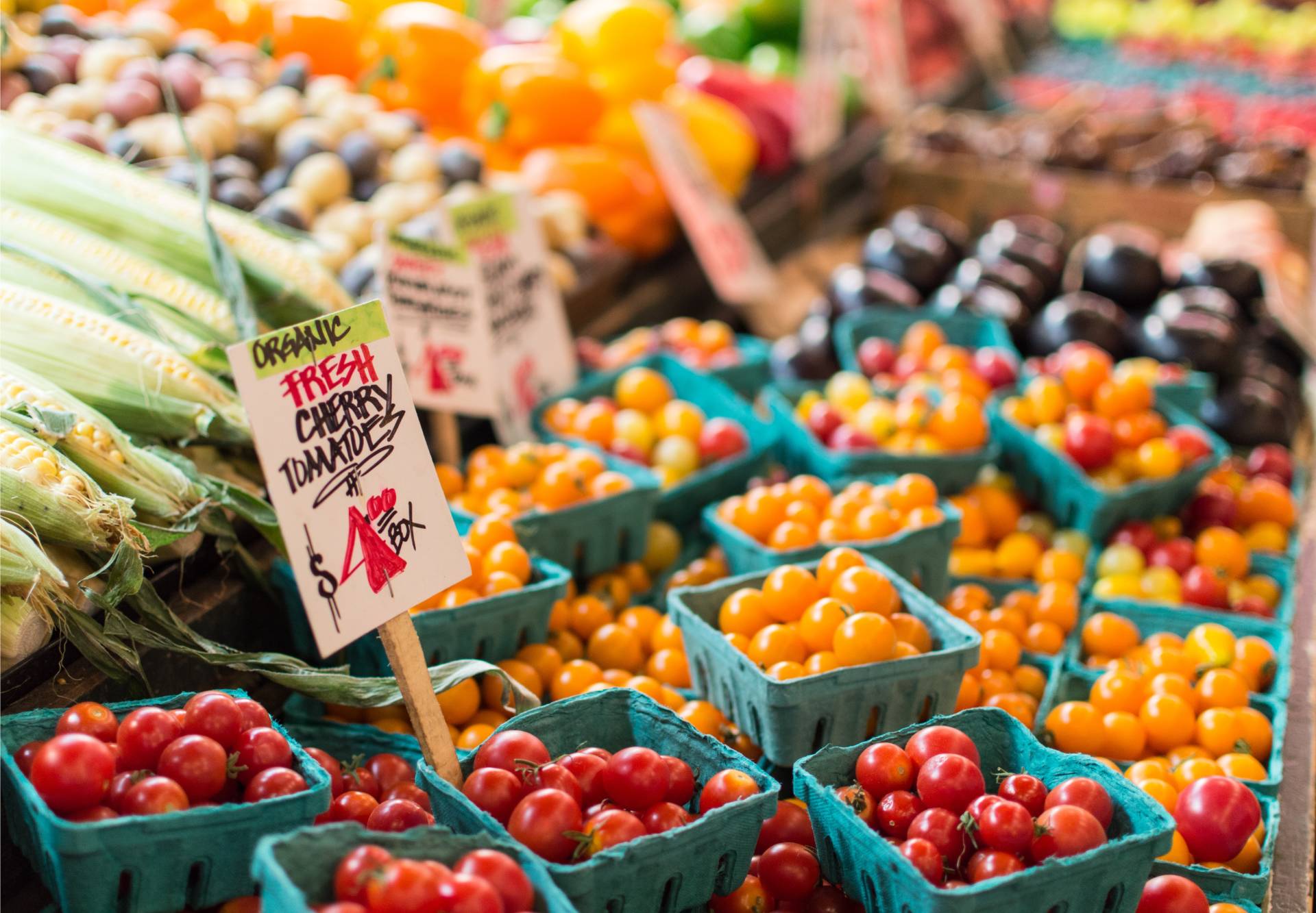 Tomatoes for sale at farmer's market stand